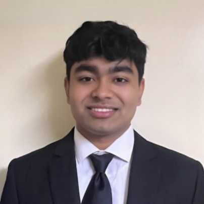 Picture of Kazi Hossain wearing a suit and tie
